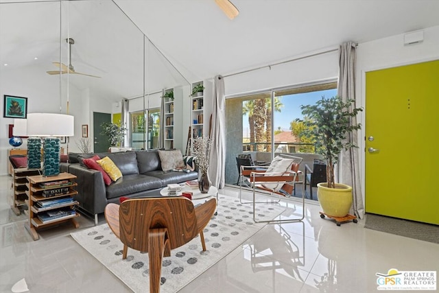 interior space with vaulted ceiling and ceiling fan