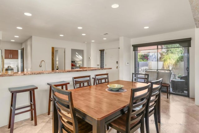 dining space featuring sink