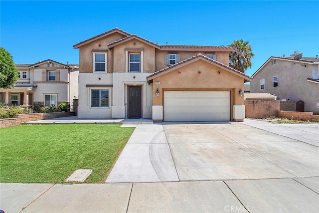 mediterranean / spanish home with a front yard