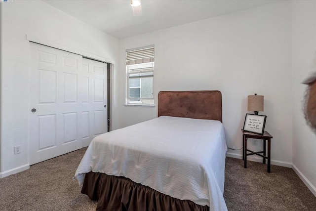 bedroom with carpet flooring, ceiling fan, and a closet