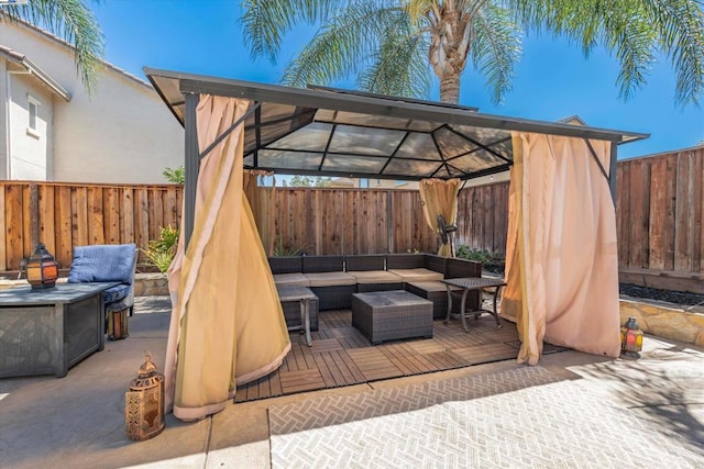 view of patio with a gazebo and outdoor lounge area