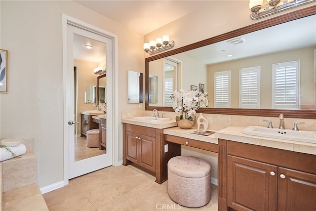 bathroom with vanity and tile patterned floors