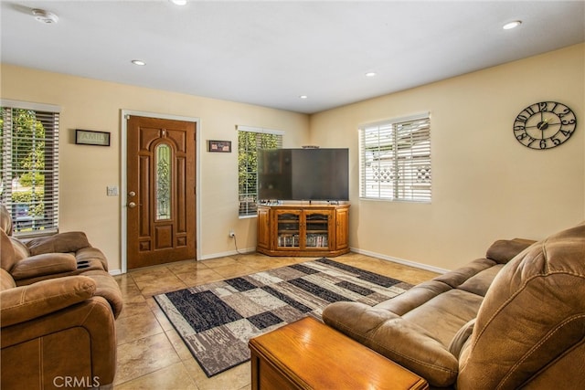 living room with light tile patterned floors