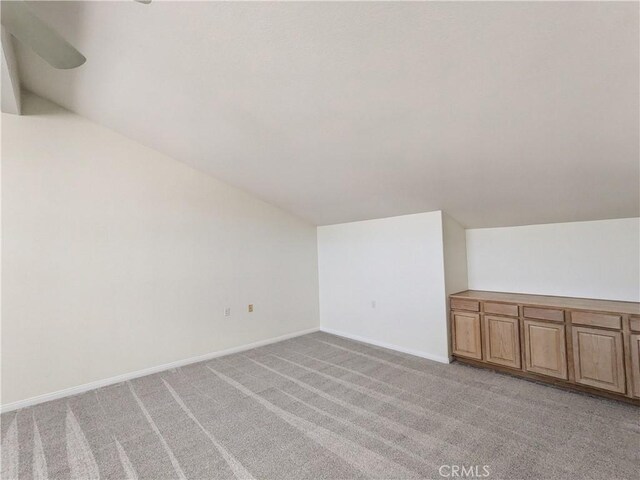 3310 Tripoli Way, Oceanside, CA 92056 - bonus room featuring lofted ceiling, light colored carpet, and baseboards
