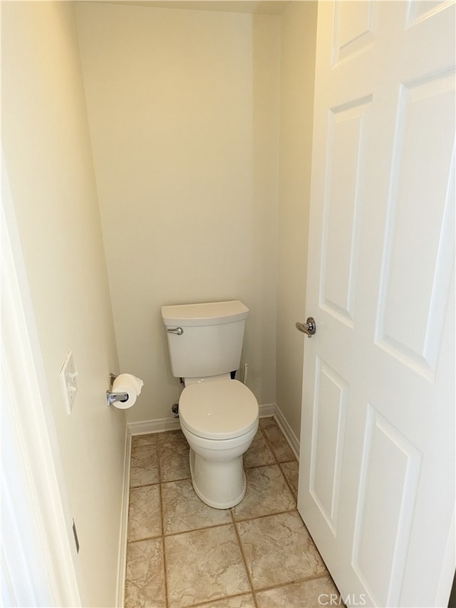 bathroom featuring toilet