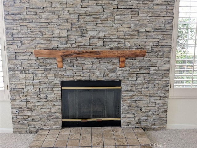 3310 Tripoli Way, Oceanside, CA 92056 - detailed view of baseboards, carpet, and a fireplace