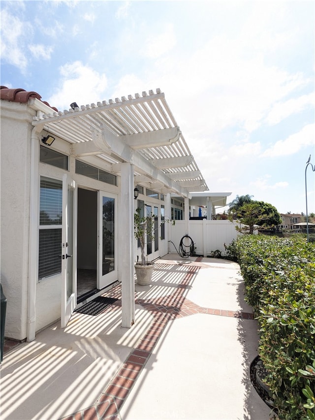 view of patio featuring a pergola