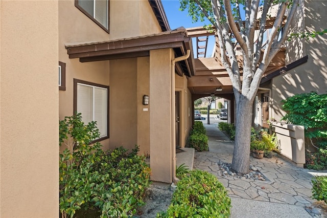 entrance to property with a patio area