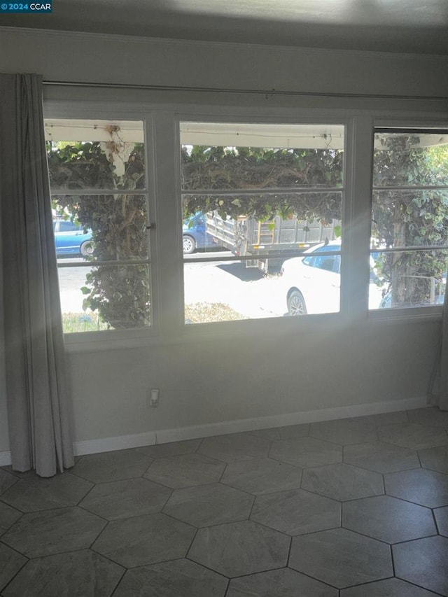 spare room with plenty of natural light