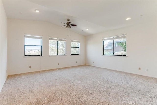 1550 Pineridge Dr, Cambria, CA 93428 - spare room with recessed lighting, ceiling fan, vaulted ceiling, and light carpet