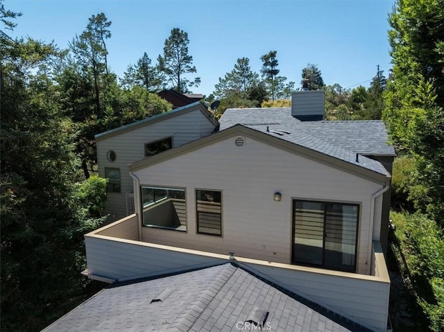 1550 Pineridge Dr, Cambria, CA 93428 - back of house with a chimney and a patio area