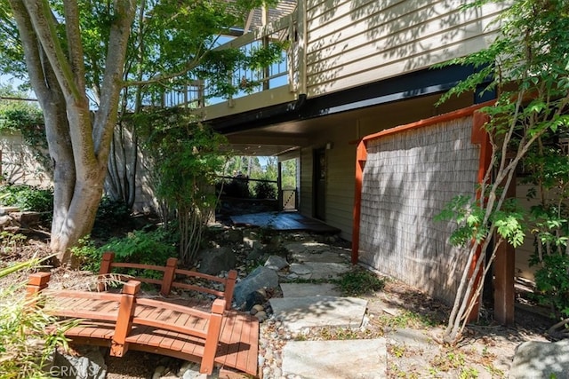 view of side of property with a carport