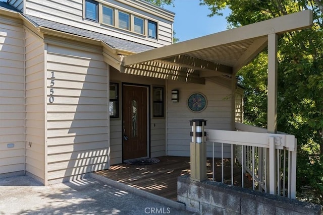 1550 Pineridge Dr, Cambria, CA 93428 - view of exterior entry with a shingled roof