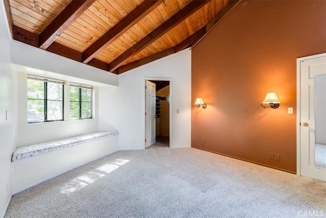 1550 Pineridge Dr, Cambria, CA 93428 - carpeted spare room featuring baseboards, high vaulted ceiling, wooden ceiling, and beam ceiling