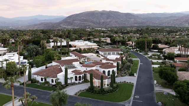 aerial view at dusk with a mountain view