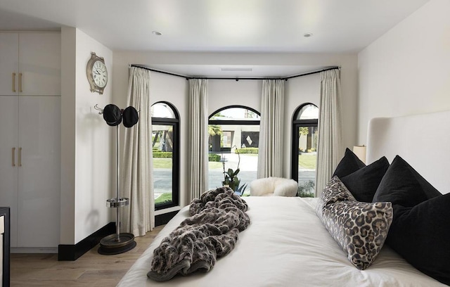 bedroom featuring light hardwood / wood-style floors