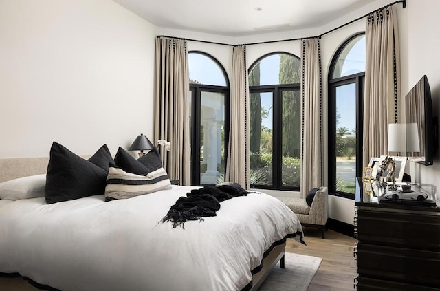 bedroom featuring light hardwood / wood-style flooring