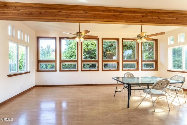 sunroom / solarium with ceiling fan