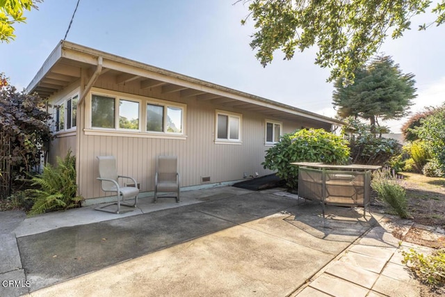 rear view of house featuring a patio area