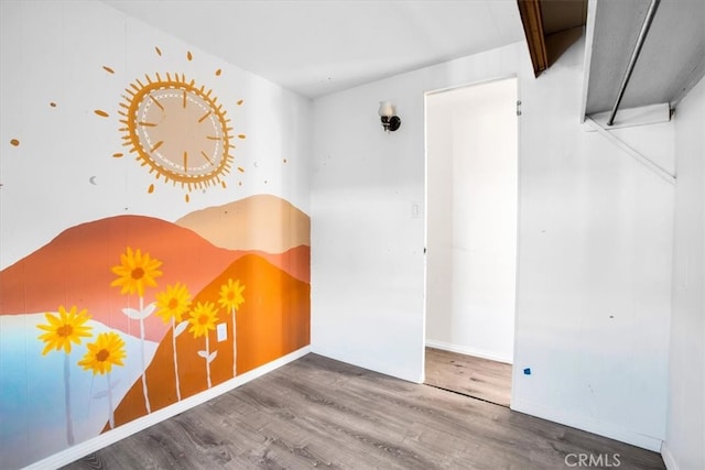 unfurnished bedroom with wood-type flooring