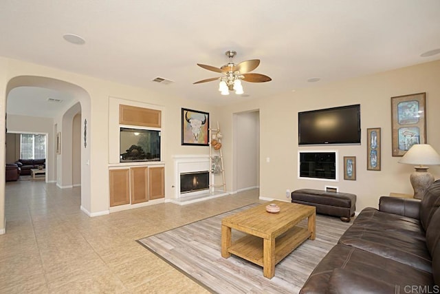 living room featuring ceiling fan