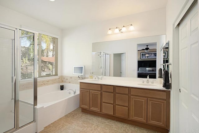 bathroom with vanity, tile patterned floors, ceiling fan, and independent shower and bath