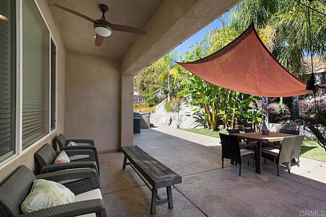 view of patio with ceiling fan, outdoor lounge area, and outdoor dining space