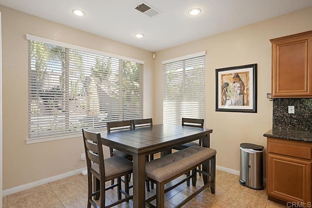 dining space featuring recessed lighting, visible vents, baseboards, and light tile patterned floors