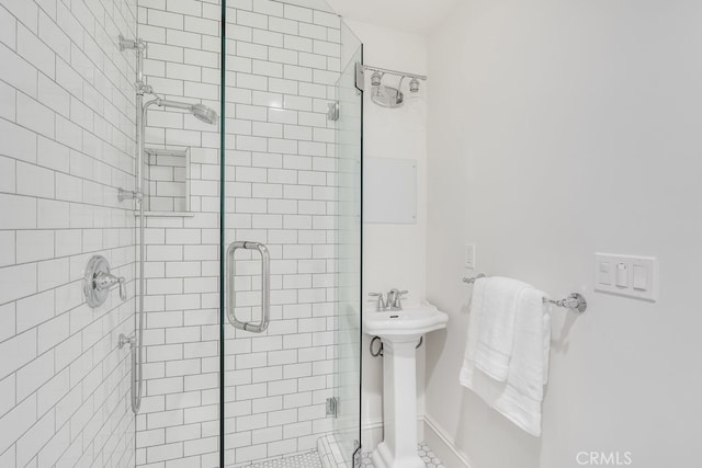 bathroom featuring walk in shower