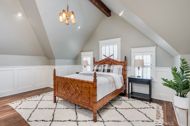 bedroom with light hardwood / wood-style flooring, a chandelier, and lofted ceiling with beams