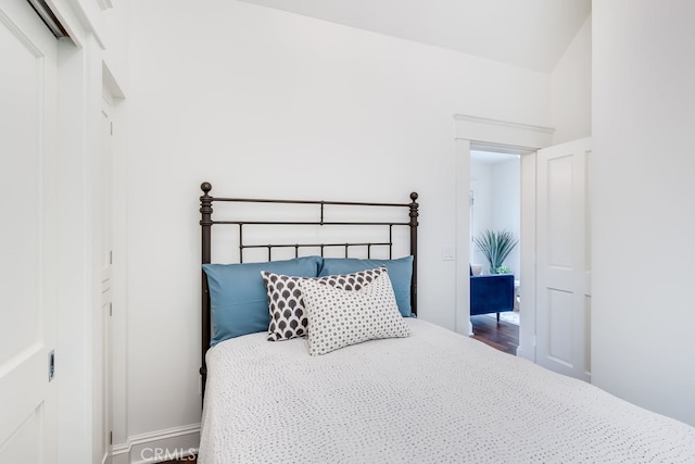 bedroom with wood-type flooring