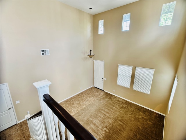 interior space featuring tile patterned flooring and plenty of natural light