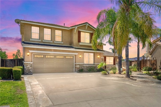 view of front of home with a garage