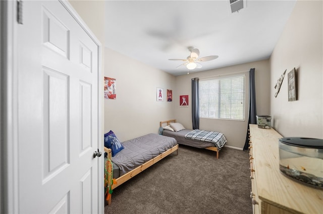 bedroom with ceiling fan and carpet floors