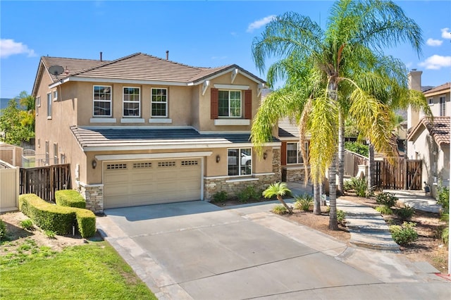 view of front of property featuring a garage