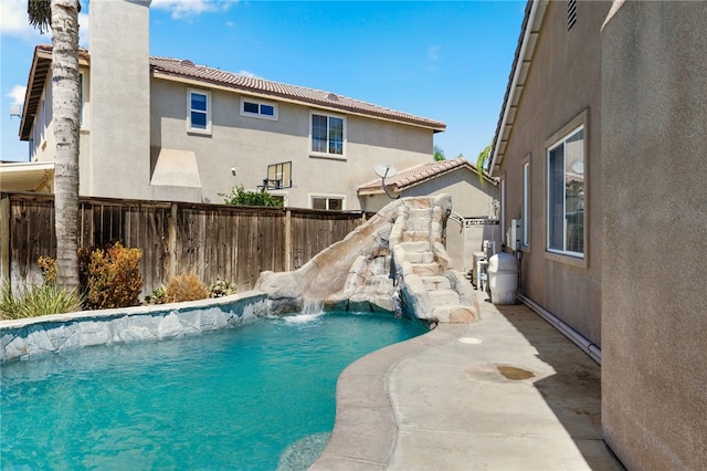 view of pool featuring pool water feature