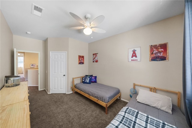 carpeted bedroom with ceiling fan