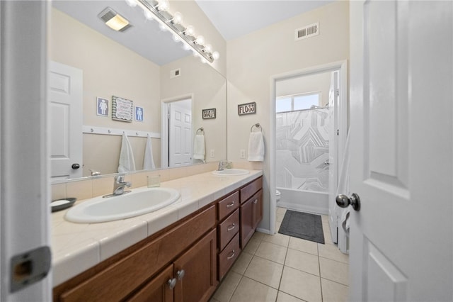 full bathroom featuring shower / bath combination with curtain, vanity, toilet, and tile patterned floors