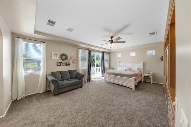 carpeted bedroom featuring access to exterior and ceiling fan