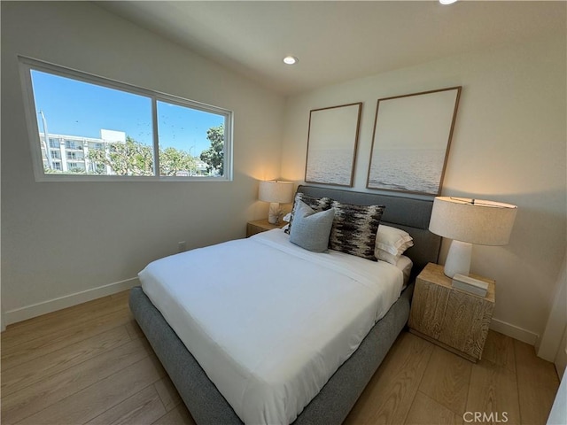 bedroom featuring light hardwood / wood-style floors