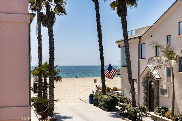 property view of water featuring a beach view