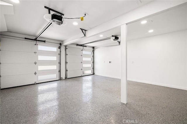 garage featuring a garage door opener