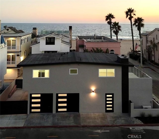 exterior space with a water view