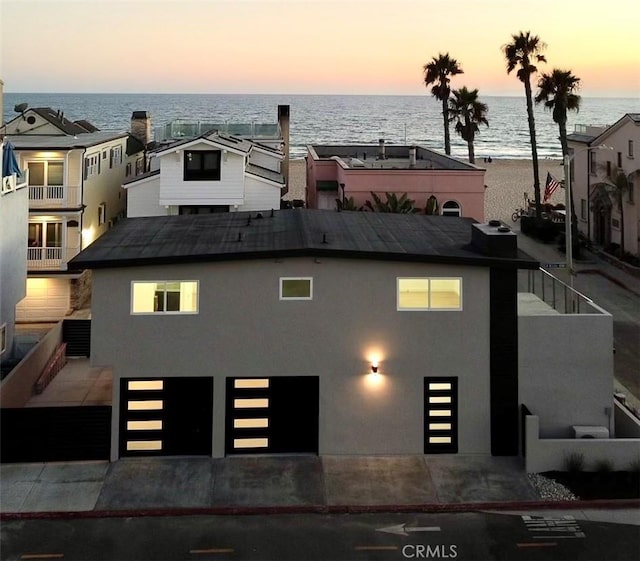 outdoor building at dusk with a water view