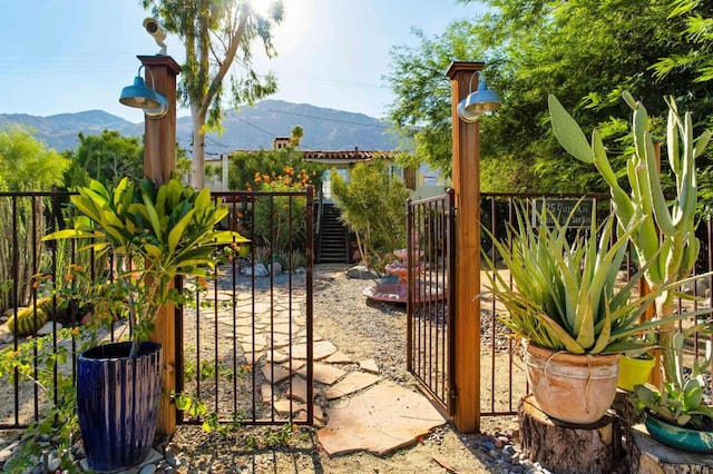 view of gate featuring a mountain view