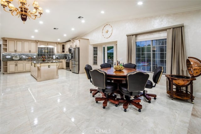 dining area with crown molding, lofted ceiling, and a notable chandelier