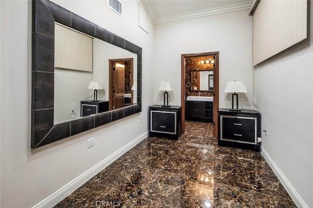 bathroom with ornamental molding