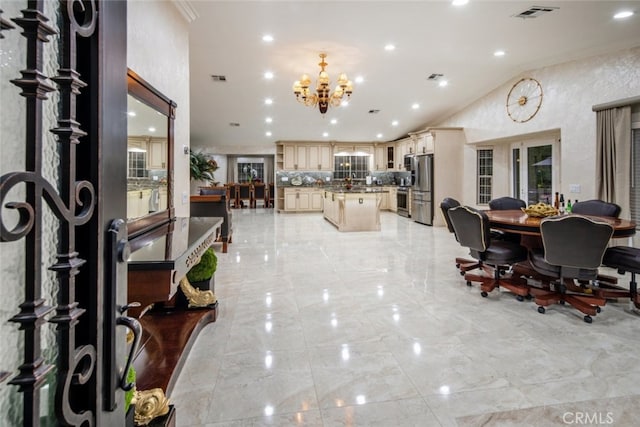 interior space featuring crown molding and a chandelier