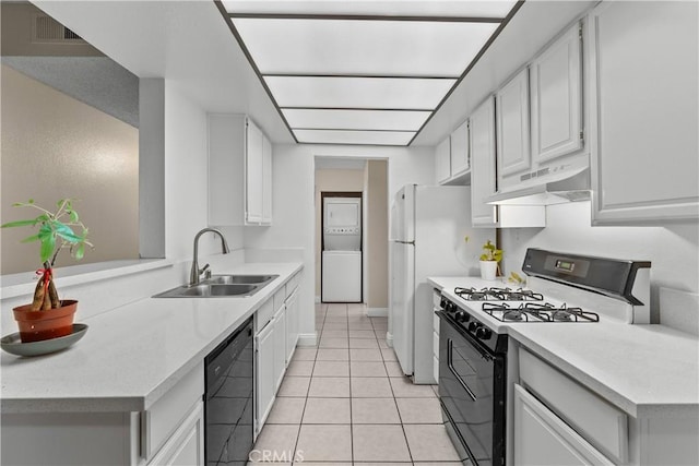 kitchen with white cabinetry, dishwasher, sink, gas range oven, and light tile patterned floors