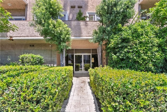 view of exterior entry with french doors